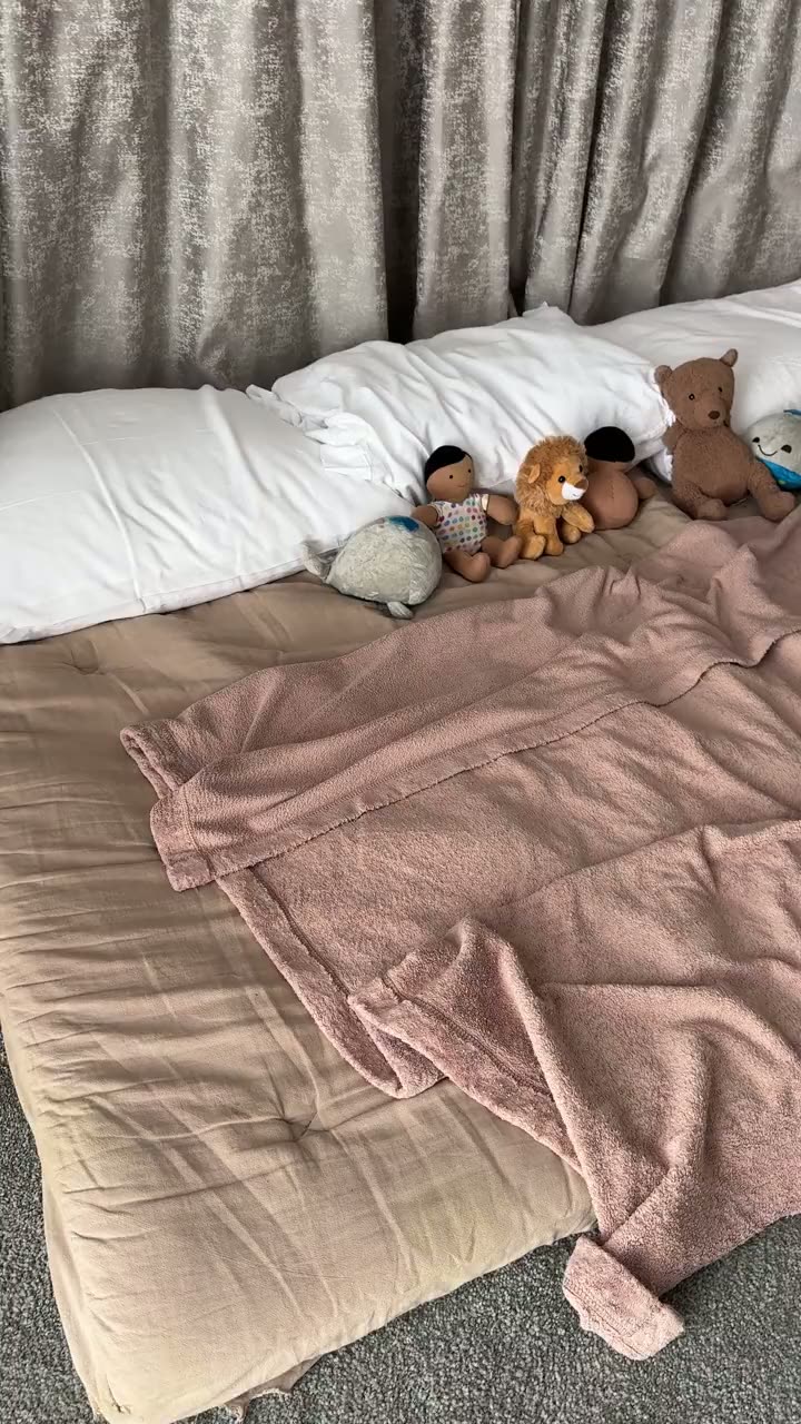 A short clip of the twins' stuffed animals arranged by the Terranea team on their floor bed in the casita