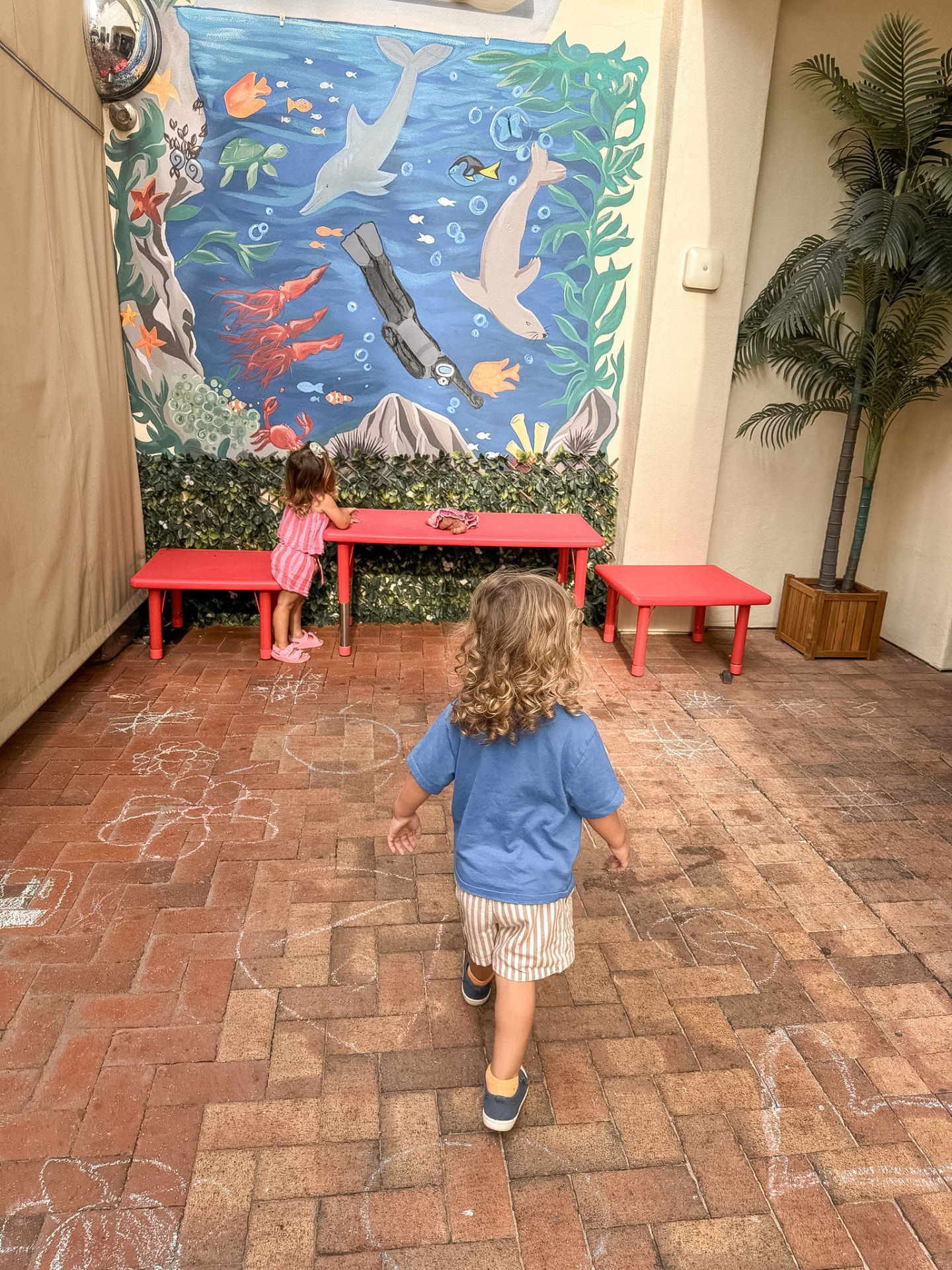 One of our twins investigating a resort family and kids area