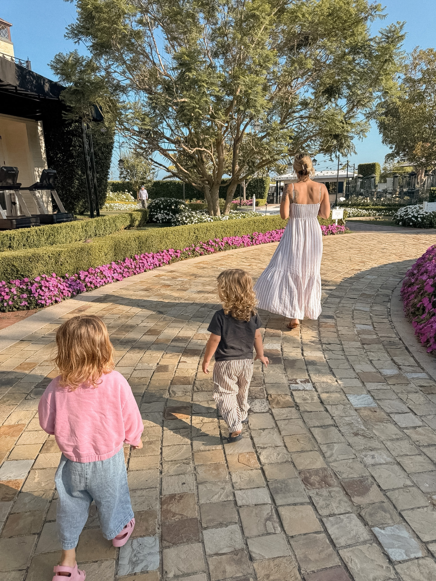 Our family walking through landscaped resort grounds
