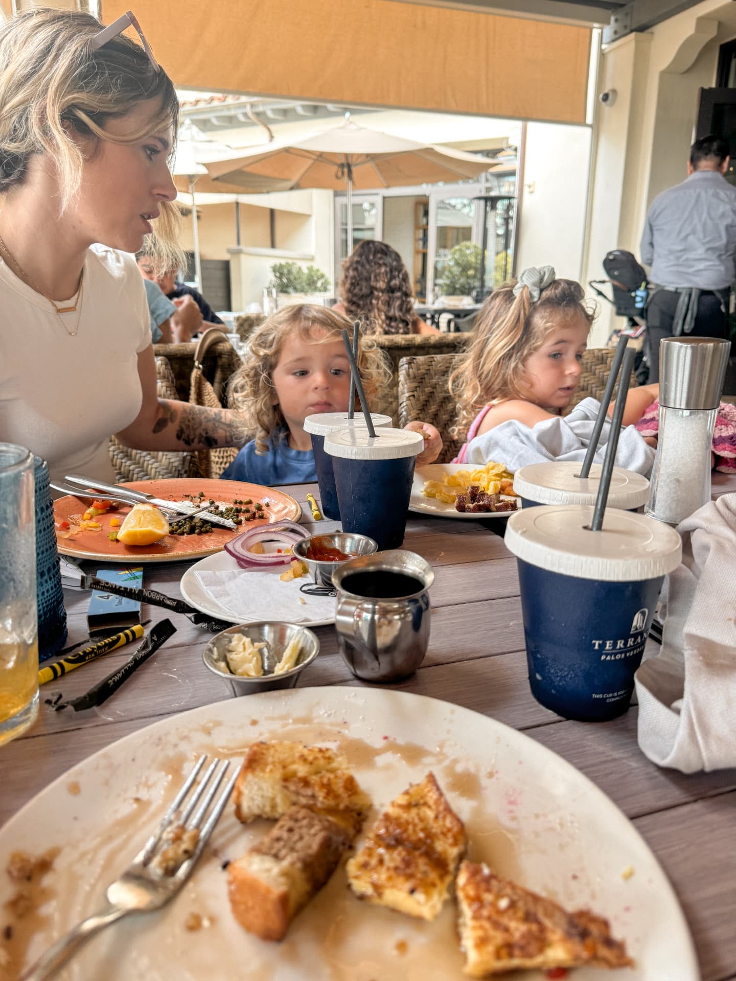 Breakfast mid-meal at catalina kitchen at Terranea, with both twins at the table