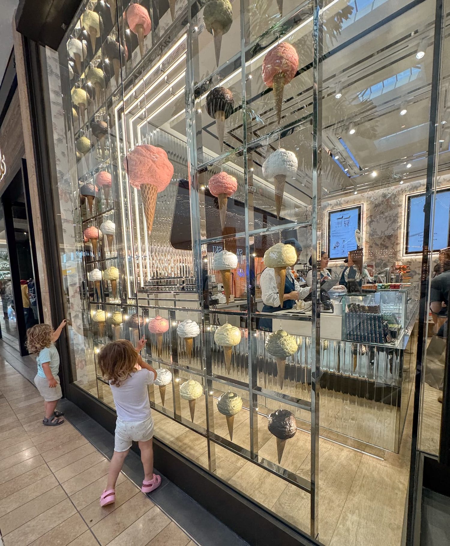 Twins looking at the gelato display at South Coast Plaza