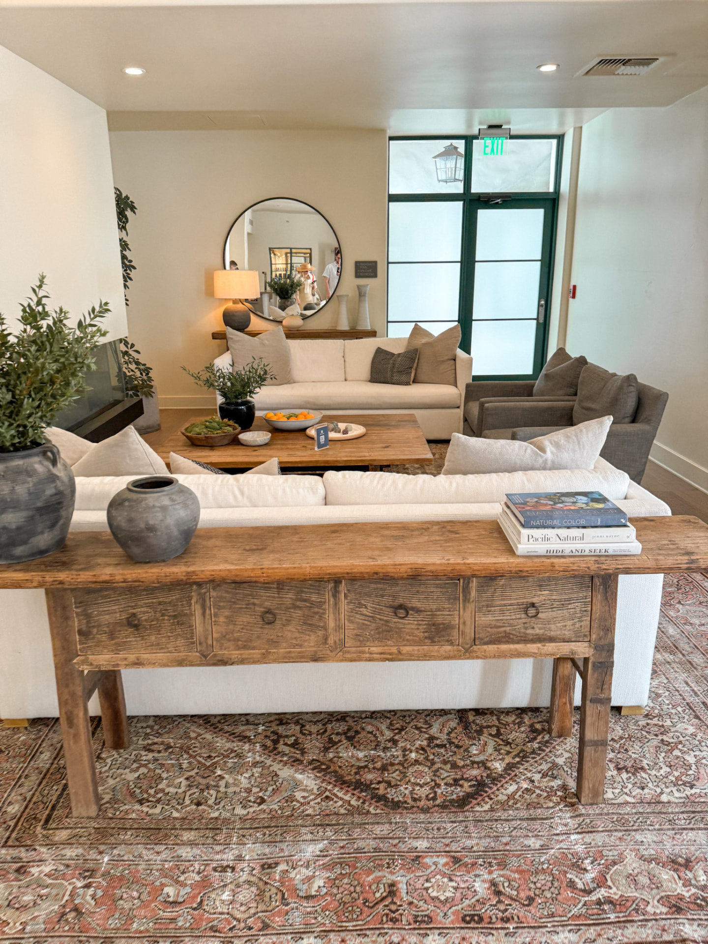 A quiet hospitality interior at Ojai Valley Inn, warm wood, tile and lamplight